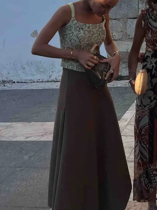 Alquilar Conjunto vintage cuerpo verda y falda marron, talla S, en Jointy